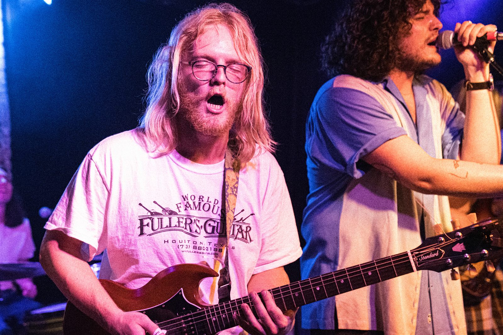 Benjamin Ballard performing with a bandmate on vocals